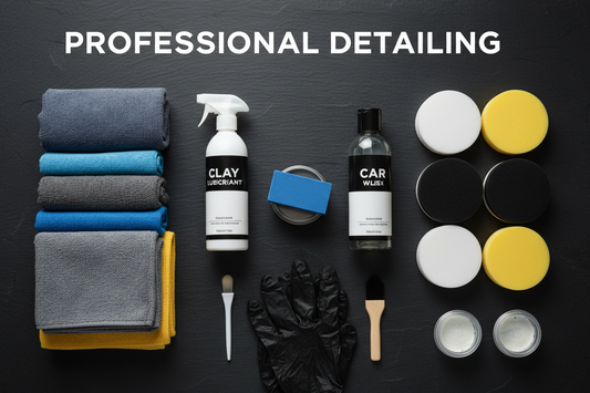 Full car detailing setup — clay bar, polish, wax, microfiber towels and applicator pads flat lay