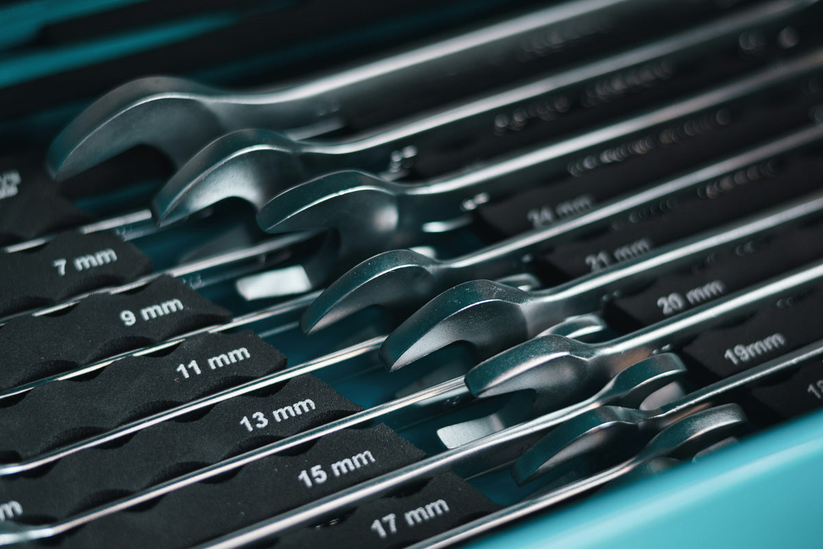 Wrench set with multiple sizes arranged for automotive use