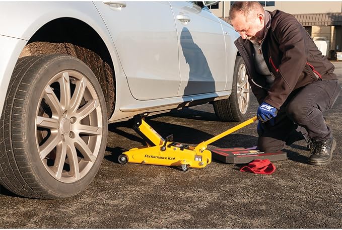 Performance Tool W1640 2-1/2 Ton Garage Jack, (5,000 lbs.) 5-15.5-Inch Lift, Swivel Casters, For Cars/Trucks